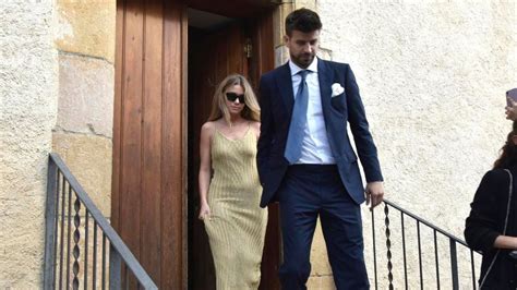 Piqué and Clara Chía were all smiles at a wedding in Spain [Photos].